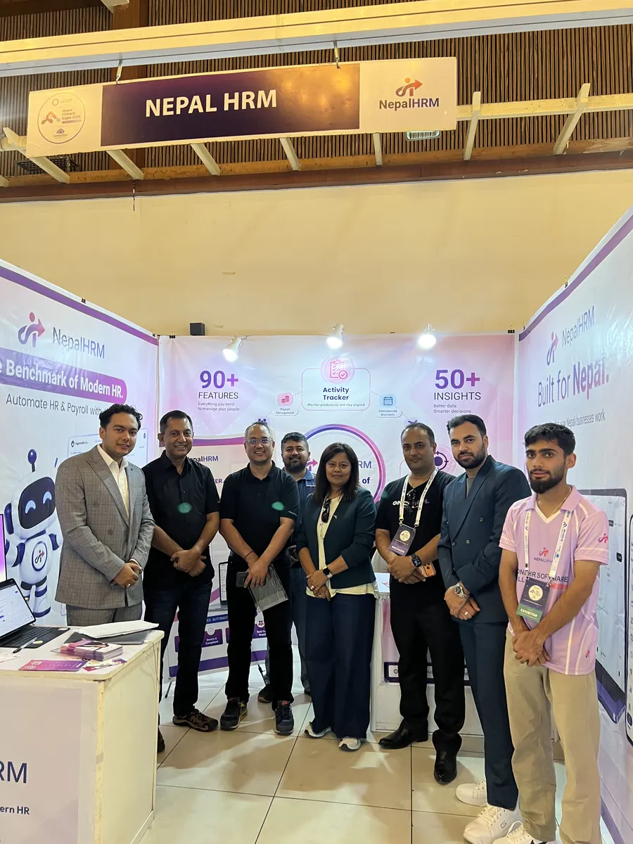 Eight people standing at the NepalHRM stall under its NEPAL HRM name board at Nepal Fintech Expo 2026